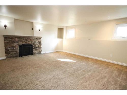 349 Leaside Avenue South, Lethbridge, AB - Indoor With Fireplace