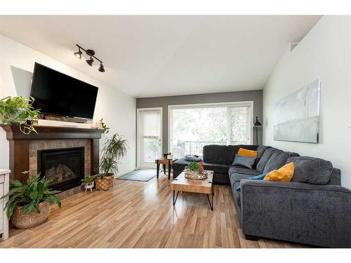 254 Firelight Crescent West, Lethbridge, AB - Indoor Photo Showing Living Room With Fireplace