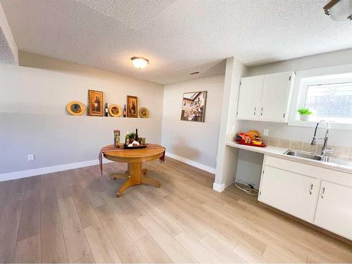 4330 4Th Avenue South, Lethbridge, AB - Indoor Photo Showing Kitchen With Double Sink