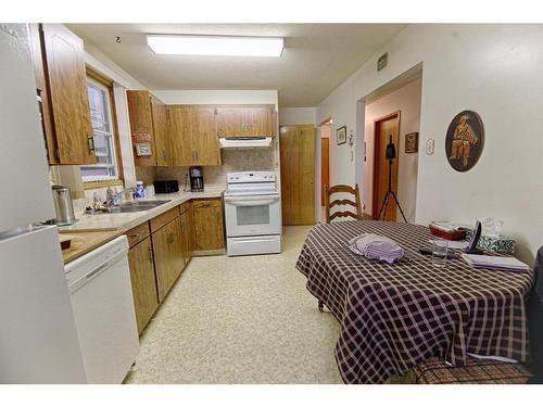 1038 Great Lakes Road South, Lethbridge, AB - Indoor Photo Showing Kitchen With Double Sink