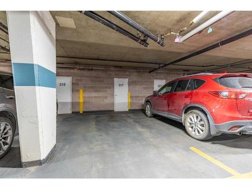 317-100 2 Avenue South, Lethbridge, AB - Indoor Photo Showing Garage