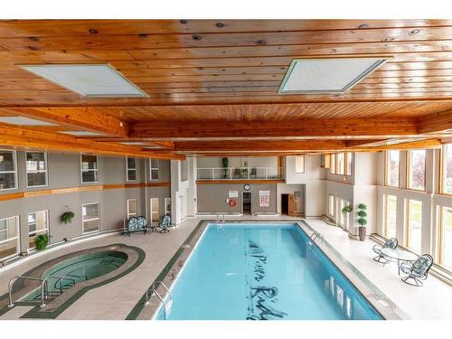 317-100 2 Avenue South, Lethbridge, AB - Indoor Photo Showing Other Room With In Ground Pool