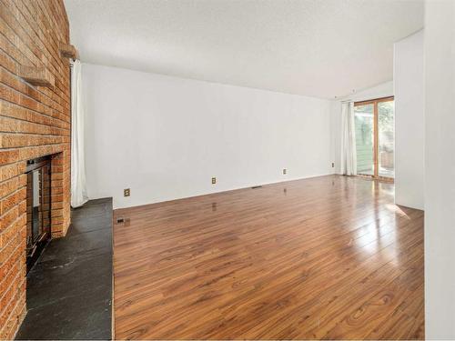 2614 22 Avenue South, Lethbridge, AB - Indoor Photo Showing Other Room With Fireplace