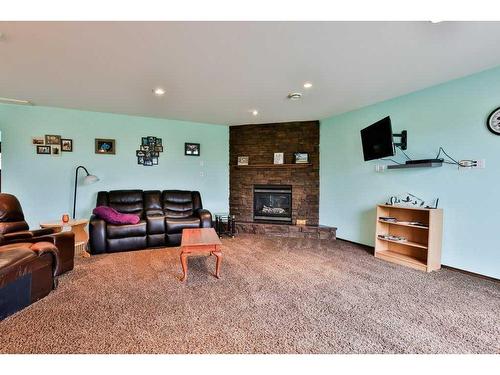 91041 Rge Rd 164, Taber, AB - Indoor Photo Showing Living Room With Fireplace