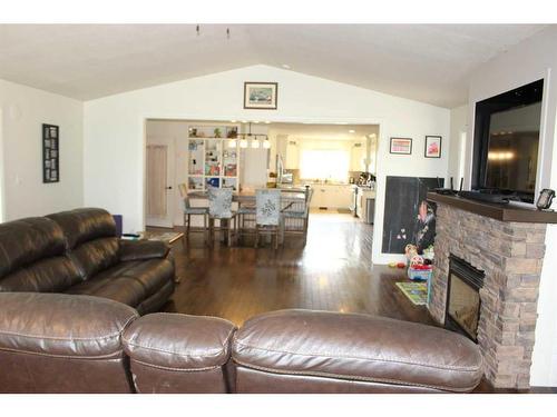 110046 Rg Rd 205, Picture Butte, AB - Indoor Photo Showing Living Room With Fireplace