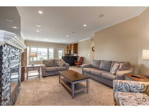 2609 Aspen Drive, Coaldale, AB - Indoor Photo Showing Living Room With Fireplace