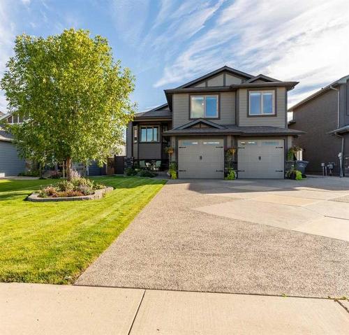 2609 Aspen Drive, Coaldale, AB - Outdoor With Facade