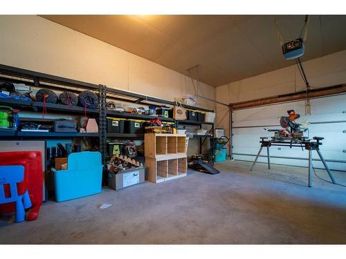 35 Squamish Boulevard West, Lethbridge, AB - Indoor Photo Showing Garage