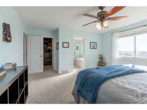 409 Arbourwood Terrace South, Lethbridge, AB - Indoor Photo Showing Bedroom