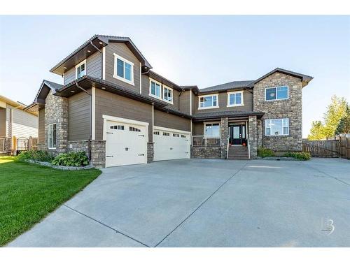 409 Arbourwood Terrace South, Lethbridge, AB - Outdoor With Facade