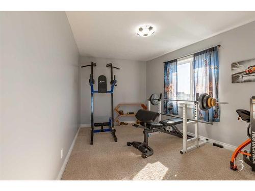 409 Arbourwood Terrace South, Lethbridge, AB - Indoor Photo Showing Gym Room