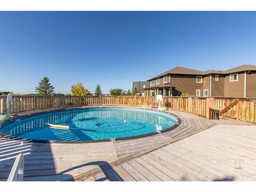 409 Arbourwood Terrace South, Lethbridge, AB - Outdoor With Above Ground Pool With Exterior