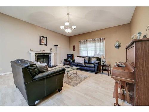 13538 19Th Avenue, Blairmore, AB - Indoor Photo Showing Living Room With Fireplace