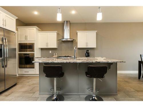 523 Firelight Place West, Lethbridge, AB - Indoor Photo Showing Kitchen With Upgraded Kitchen