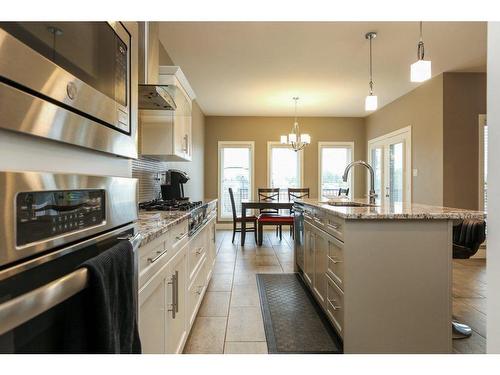 523 Firelight Place West, Lethbridge, AB - Indoor Photo Showing Kitchen With Upgraded Kitchen