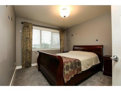 523 Firelight Place West, Lethbridge, AB - Indoor Photo Showing Bedroom