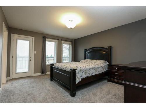 523 Firelight Place West, Lethbridge, AB - Indoor Photo Showing Bedroom