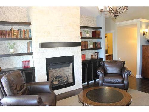 751 Northridge Street, Picture Butte, AB - Indoor Photo Showing Living Room With Fireplace