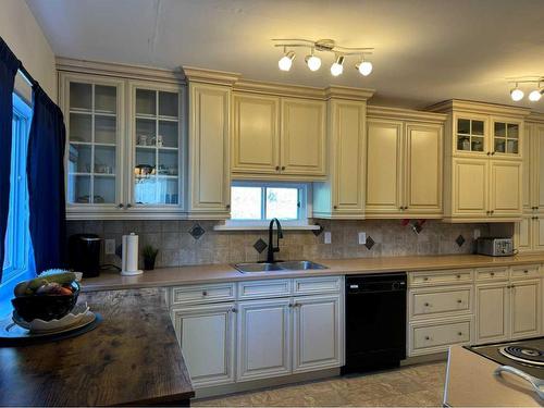 677 Frederick Street, Pincher Creek, AB - Indoor Photo Showing Kitchen With Double Sink