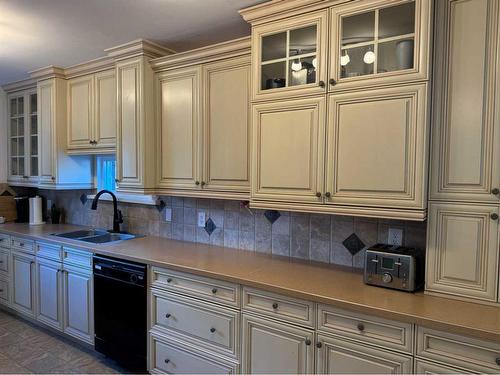 677 Frederick Street, Pincher Creek, AB - Indoor Photo Showing Kitchen With Double Sink