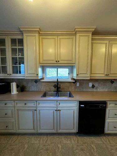 677 Frederick Street, Pincher Creek, AB - Indoor Photo Showing Kitchen With Double Sink