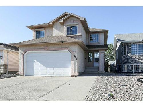 315 Heritage Crescent West, Lethbridge, AB - Outdoor With Facade