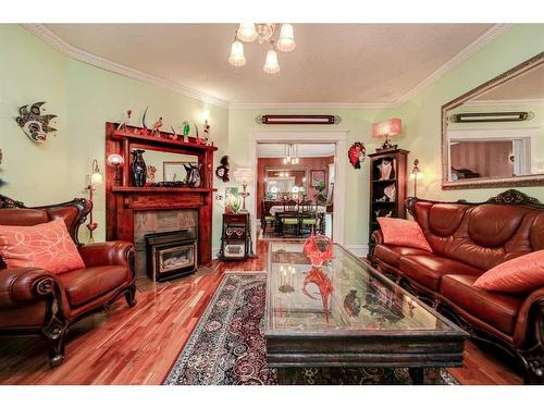 633 5 Street South, Lethbridge, AB - Indoor Photo Showing Living Room With Fireplace