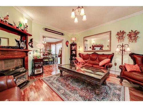 633 5 Street South, Lethbridge, AB - Indoor Photo Showing Living Room With Fireplace