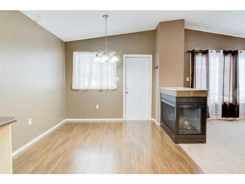 572 Sunridge Crescent West, Lethbridge, AB - Indoor With Fireplace