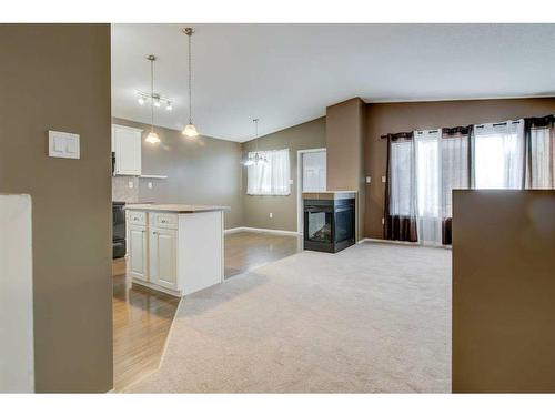 572 Sunridge Crescent West, Lethbridge, AB - Indoor With Fireplace