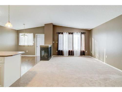 572 Sunridge Crescent West, Lethbridge, AB - Indoor With Fireplace