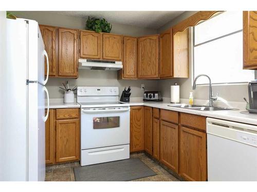 2434 7A Avenue North, Lethbridge, AB - Indoor Photo Showing Kitchen With Double Sink