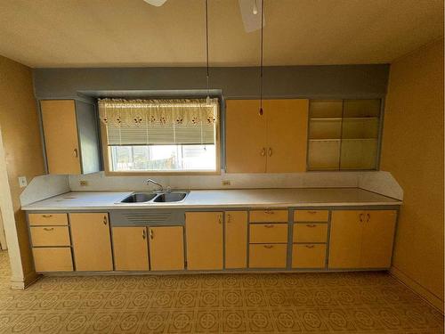 241 1 Street West, Cardston, AB - Indoor Photo Showing Kitchen With Double Sink