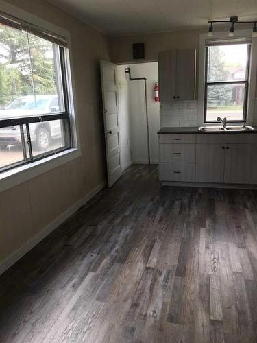 106 3Rd Street, Picture Butte, AB - Indoor Photo Showing Kitchen With Double Sink