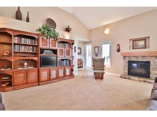 360 E 1 Avenue South, Magrath, AB - Indoor Photo Showing Living Room With Fireplace