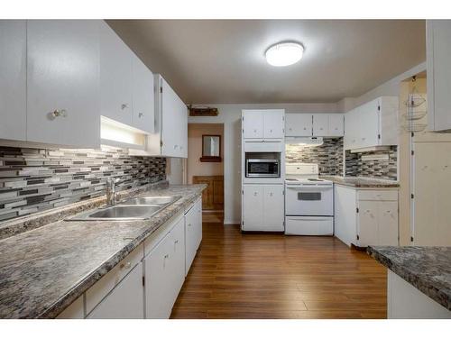 612 12 Street South, Lethbridge, AB - Indoor Photo Showing Kitchen With Double Sink