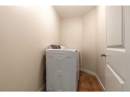 128 Rivermill Landing West, Lethbridge, AB - Indoor Photo Showing Laundry Room