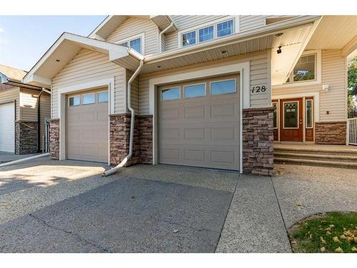 128 Rivermill Landing West, Lethbridge, AB - Outdoor With Facade