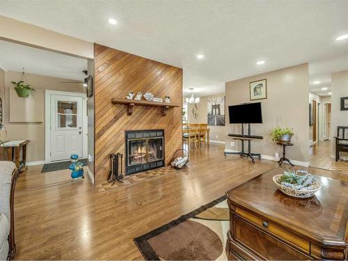 1611 24 Street South, Lethbridge, AB - Indoor Photo Showing Living Room With Fireplace