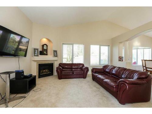 361 Red Crow Boulevard West, Lethbridge, AB - Indoor Photo Showing Living Room With Fireplace