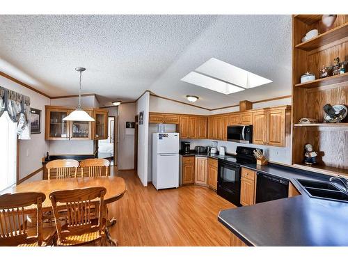 612 Grand Avenue, Carmangay, AB - Indoor Photo Showing Kitchen With Double Sink