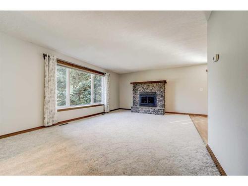 29211 Twp Road 6-0, Rural Pincher Creek No. 9, M.D. Of, AB - Indoor Photo Showing Living Room With Fireplace