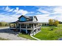 152 School Avenue, Mountain View, AB  - Outdoor With Deck Patio Veranda 