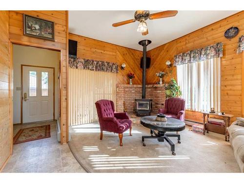 1307 24 Avenue, Coaldale, AB - Indoor Photo Showing Living Room With Fireplace