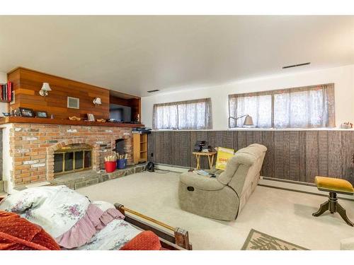 1307 24 Avenue, Coaldale, AB - Indoor With Fireplace