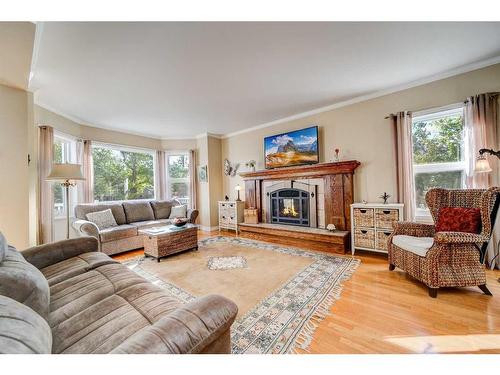 1044 Geddes Avenue East, Pincher Creek, AB - Indoor Photo Showing Living Room With Fireplace