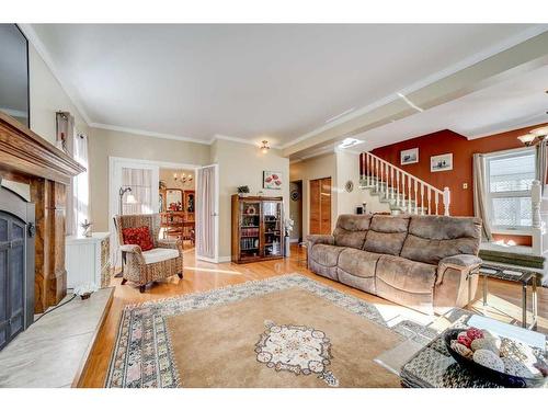 1044 Geddes Avenue East, Pincher Creek, AB - Indoor Photo Showing Living Room With Fireplace