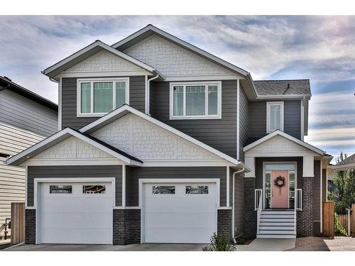 161 Sixmile Bend South, Lethbridge, AB - Outdoor With Facade