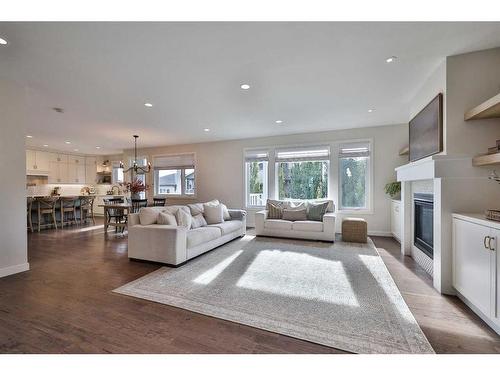 161 Sixmile Bend South, Lethbridge, AB - Indoor Photo Showing Living Room With Fireplace