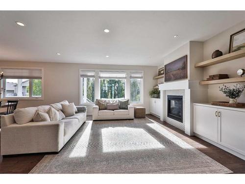 161 Sixmile Bend South, Lethbridge, AB - Indoor Photo Showing Living Room With Fireplace